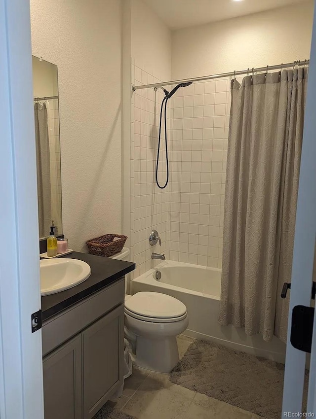 6332 E 142nd Pl, Thornton, CO 80602 - bathroom featuring vanity, shower / bath combination with curtain, toilet, tile patterned floors, and a textured wall