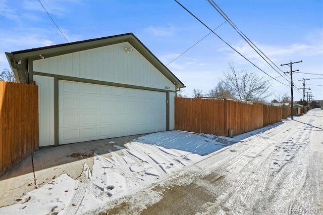 view of snow covered garage