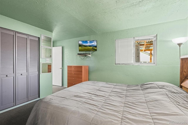 bedroom with a closet and a textured ceiling