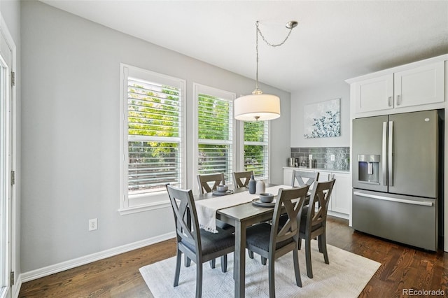 17020 E 107th Ave, Commerce City, CO 80022 - dining room featuring healthy amount of natural light and dark wood-style flooring