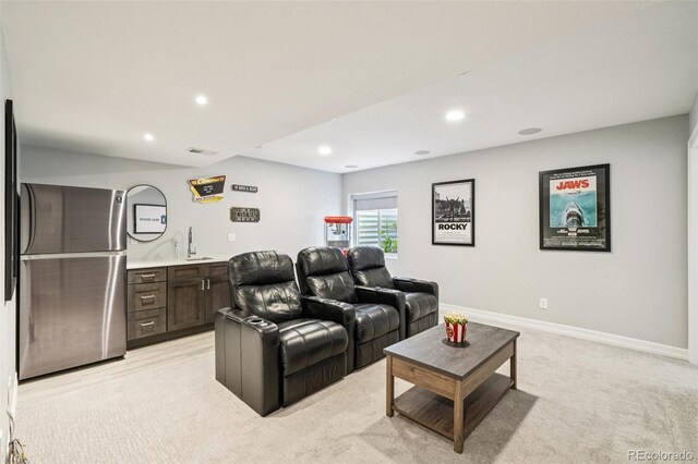 17020 E 107th Ave, Commerce City, CO 80022 - home theater room featuring recessed lighting, wet bar, and light carpet
