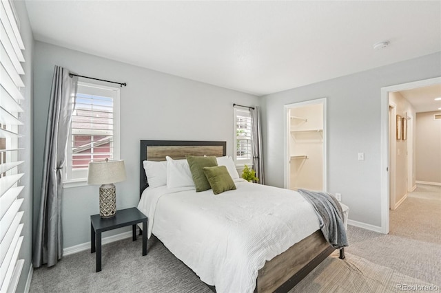 17020 E 107th Ave, Commerce City, CO 80022 - bedroom with carpet flooring and a walk in closet