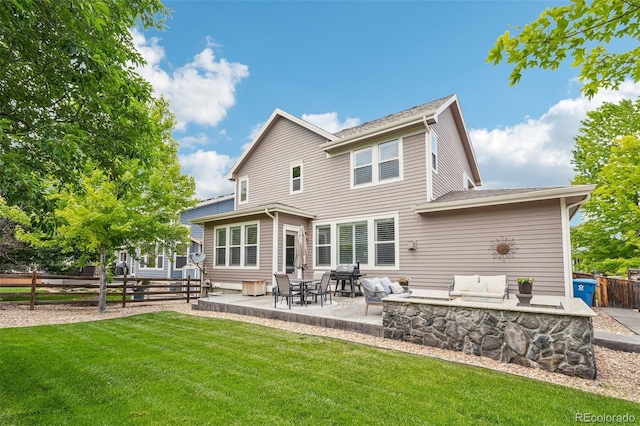 17020 E 107th Ave, Commerce City, CO 80022 - back of property featuring a patio area, an outdoor hangout area, and a fenced backyard
