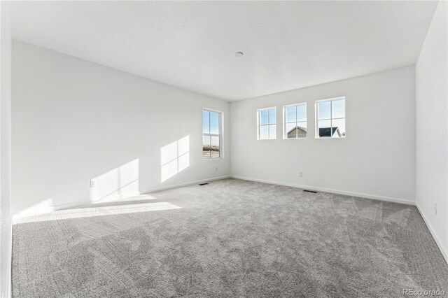 3295 N Coolidge Way, Aurora, CO 80019 - unfurnished room featuring carpet flooring and baseboards