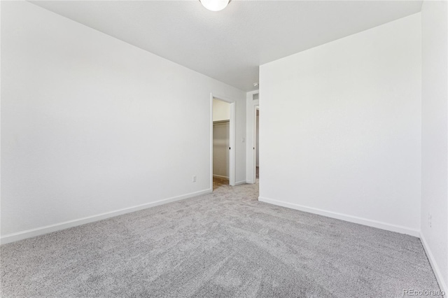 3295 N Coolidge Way, Aurora, CO 80019 - empty room featuring carpet floors and baseboards