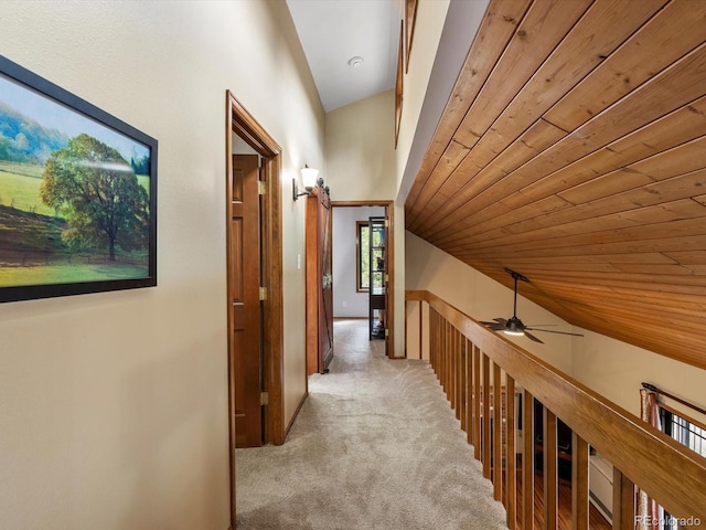 28272 Shadow Mountain Dr, Conifer, CO 80433 - hall with carpet floors and vaulted ceiling
