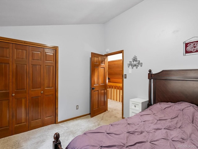 28272 Shadow Mountain Dr, Conifer, CO 80433 - bedroom with lofted ceiling, carpet flooring, a closet, and baseboards