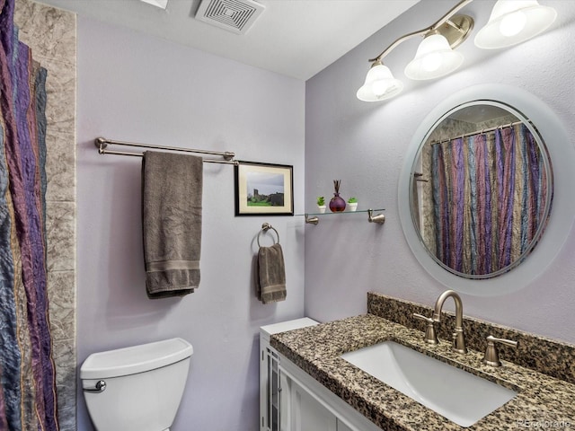 28272 Shadow Mountain Dr, Conifer, CO 80433 - full bathroom with vanity and toilet