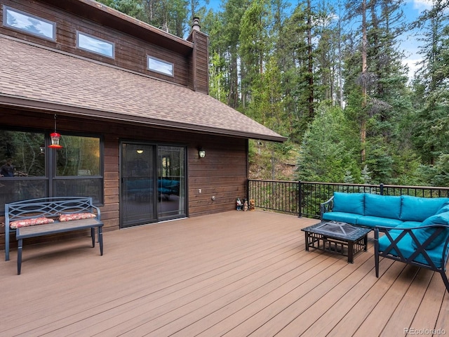 28272 Shadow Mountain Dr, Conifer, CO 80433 - wooden terrace featuring an outdoor living space