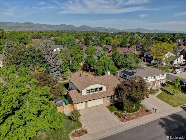 8043 S Zephyr St, Littleton, CO 80128 - aerial perspective of suburban area featuring a mountainous background