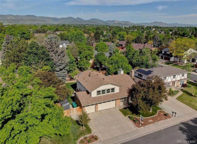8043 S Zephyr St, Littleton, CO 80128 - aerial perspective of suburban area featuring a mountainous background