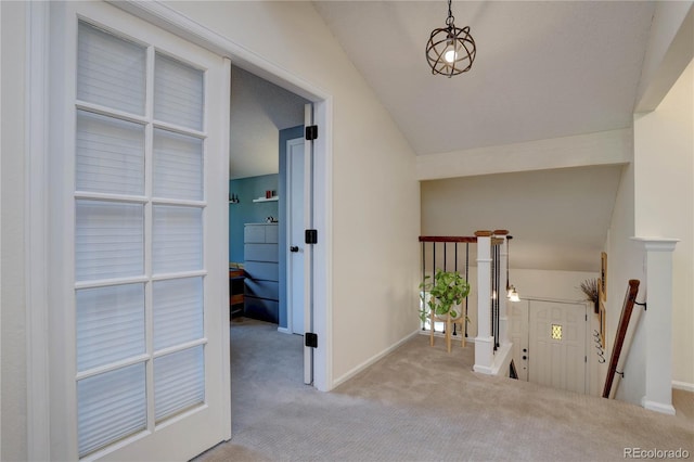8043 S Zephyr St, Littleton, CO 80128 - carpeted foyer featuring baseboards and lofted ceiling