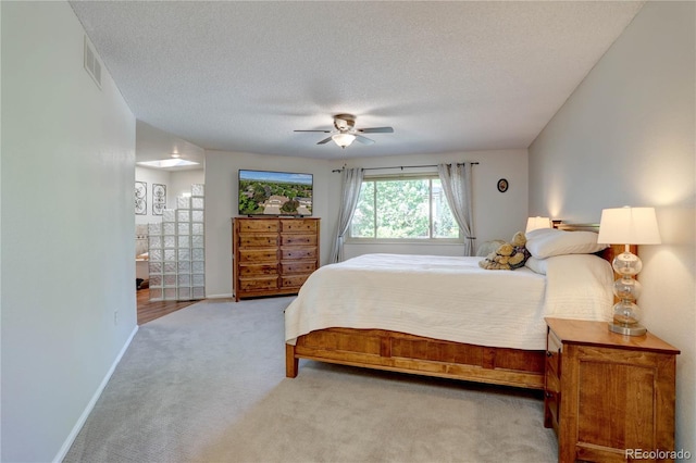 8043 S Zephyr St, Littleton, CO 80128 - carpeted bedroom featuring a textured ceiling and a ceiling fan