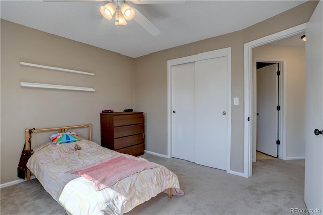 8043 S Zephyr St, Littleton, CO 80128 - bedroom with carpet, a closet, and a ceiling fan