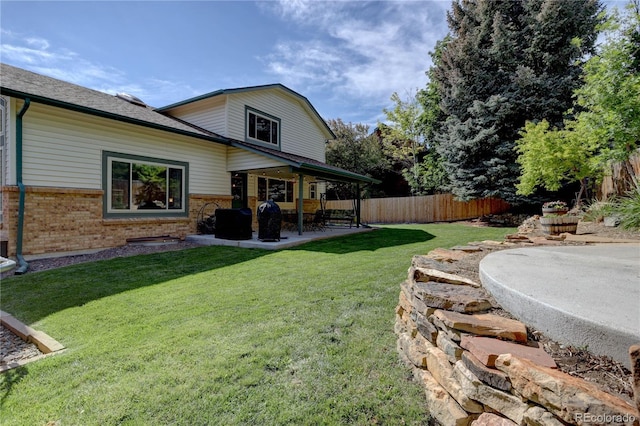8043 S Zephyr St, Littleton, CO 80128 - view of yard with a patio