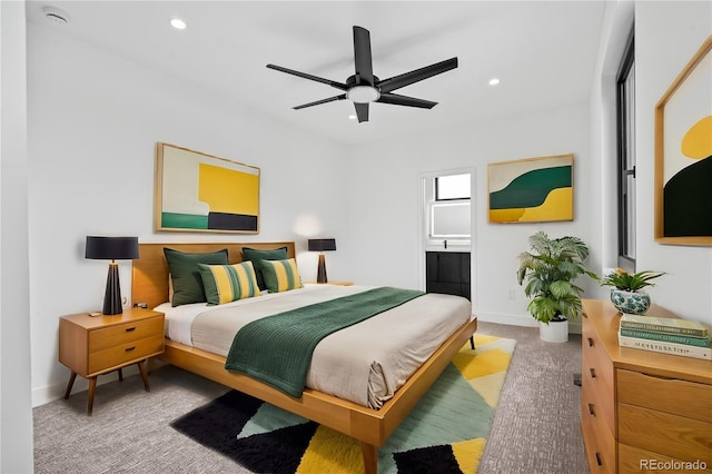 carpeted bedroom with a ceiling fan, recessed lighting, and baseboards