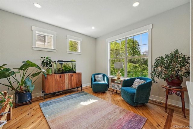 8256 E 28th Dr, Denver, CO 80238 - sitting room with hardwood / wood-style floors, baseboards, and recessed lighting