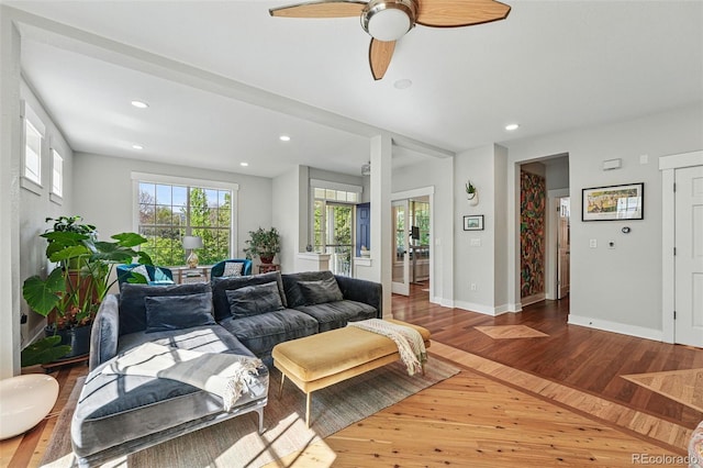 8256 E 28th Dr, Denver, CO 80238 - living room featuring wood finished floors, recessed lighting, baseboards, and ceiling fan