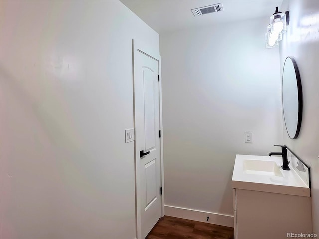 9193 US Highway 36, Joes, CO 80822 - bathroom featuring vanity and wood finished floors