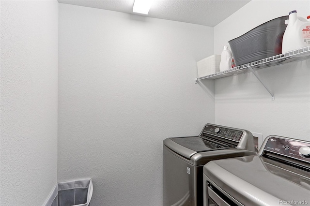 9835 Uravan St, Commerce City, CO 80022 - washroom featuring separate washer and dryer