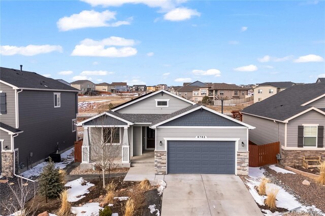9782 Emerald Vista Dr, Peyton, CO 80831 - craftsman-style house with a garage