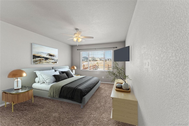 carpeted bedroom with ceiling fan and a textured ceiling