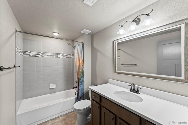 full bathroom with vanity, toilet, shower / tub combo, and a textured ceiling