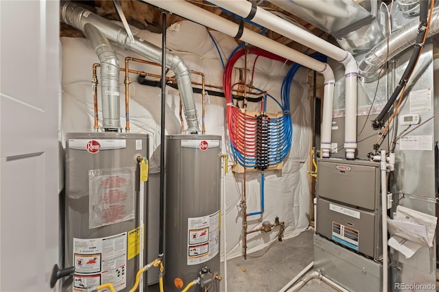 utility room featuring water heater