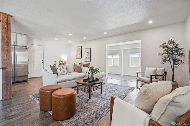 12345 W 32nd Ave, Wheat Ridge, CO 80033 - living area with recessed lighting, dark wood-style flooring, and a textured ceiling