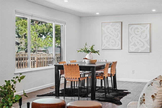 12345 W 32nd Ave, Wheat Ridge, CO 80033 - dining space featuring recessed lighting, baseboards, and wood finished floors