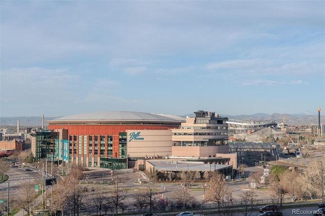 property's view of city featuring a mountain view