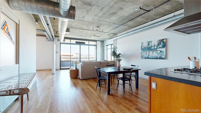 1401 Wewatta St Unit 808, Denver, CO 80202 - dining room with light wood-style floors