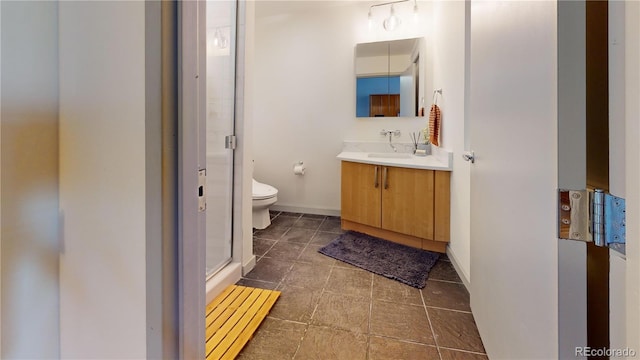 1401 Wewatta St Unit 808, Denver, CO 80202 - full bath with a stall shower, baseboards, toilet, tile patterned floors, and vanity