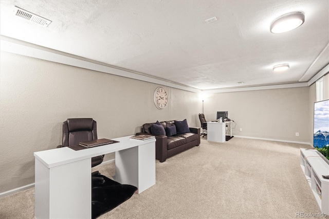 living area featuring light colored carpet, visible vents, and baseboards