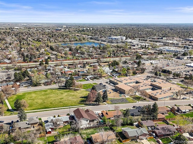 aerial view with a water view and a residential view