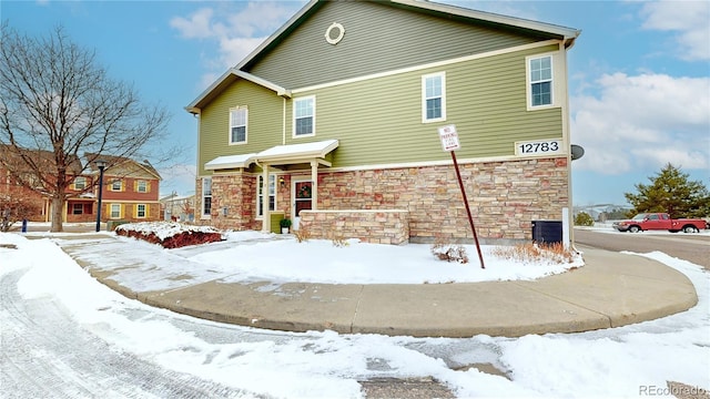 view of front of house featuring stone siding