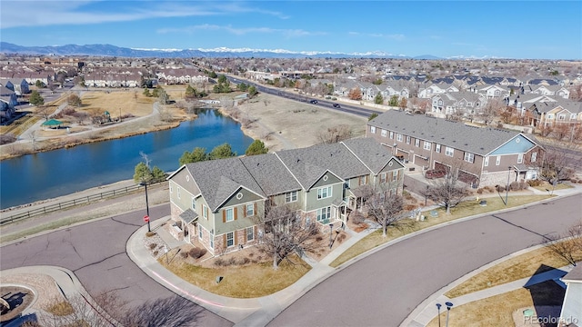 bird's eye view with a residential view and a water and mountain view