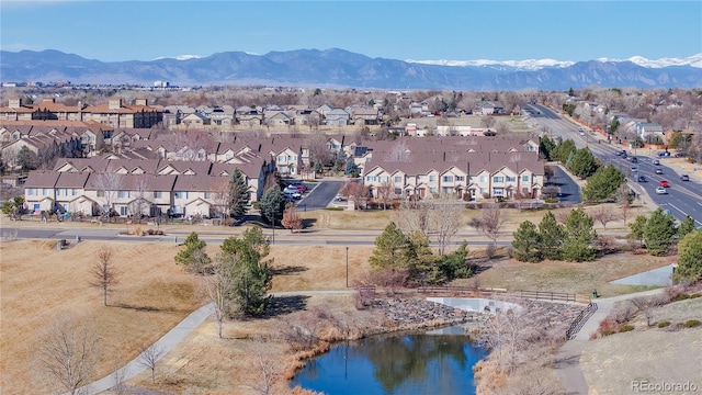 birds eye view of property with a residential view and a mountain view