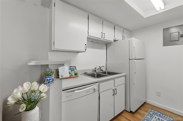 kitchen featuring a sink, electric panel, white appliances, light wood finished floors, and white cabinetry