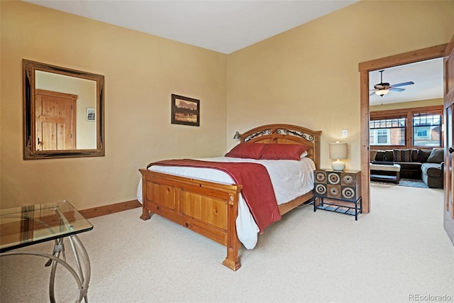 carpeted bedroom with baseboards