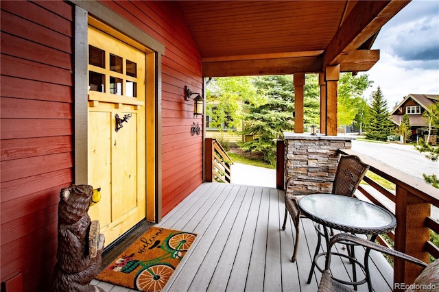 wooden deck with a porch