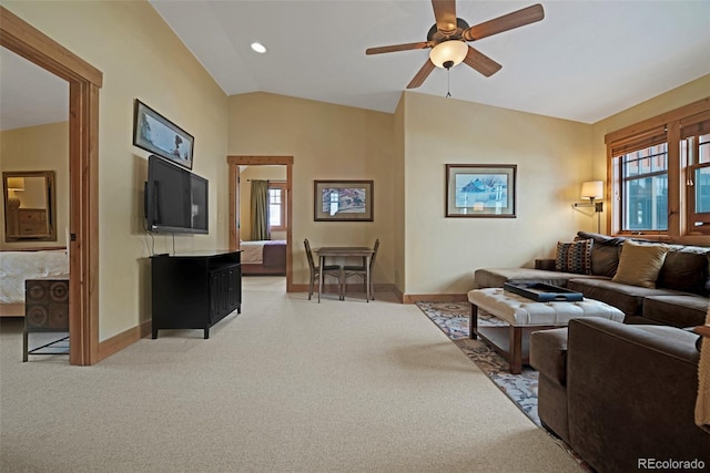 living area featuring recessed lighting, light colored carpet, vaulted ceiling, ceiling fan, and baseboards