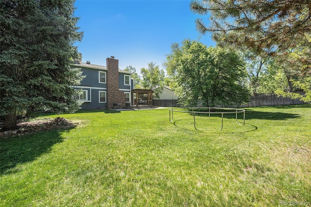 10247 W Roxbury Pl, Littleton, CO 80127 - view of yard with a patio area