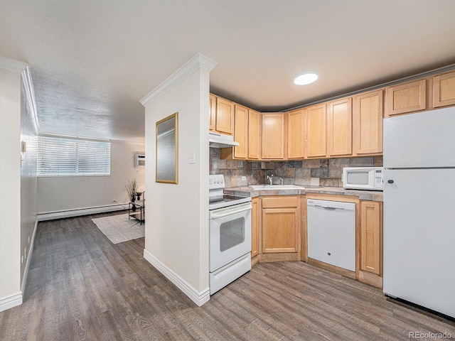 kitchen featuring white appliances, a baseboard radiator, dark wood-type flooring, and light brown cabinets