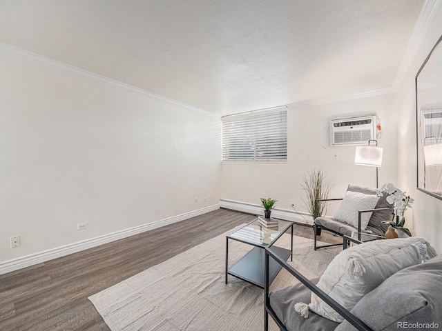 living room featuring dark hardwood / wood-style flooring, a baseboard radiator, ornamental molding, and a wall mounted AC