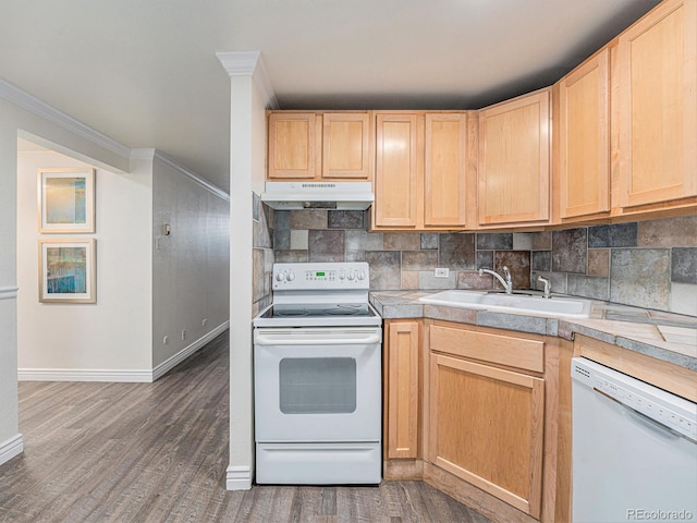 kitchen featuring ornamental molding, sink, light brown cabinets, and white appliances