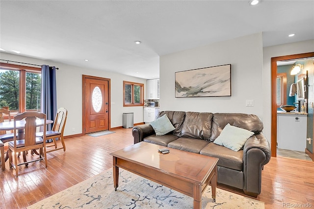 700 Rosalie Rd, Bailey, CO 80421 - living area with recessed lighting, light wood finished floors, and baseboards