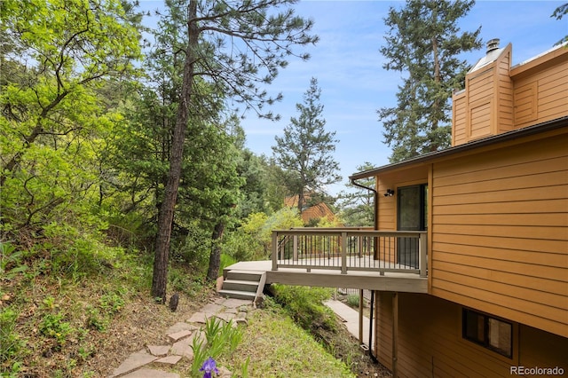 view of yard with a wooden deck