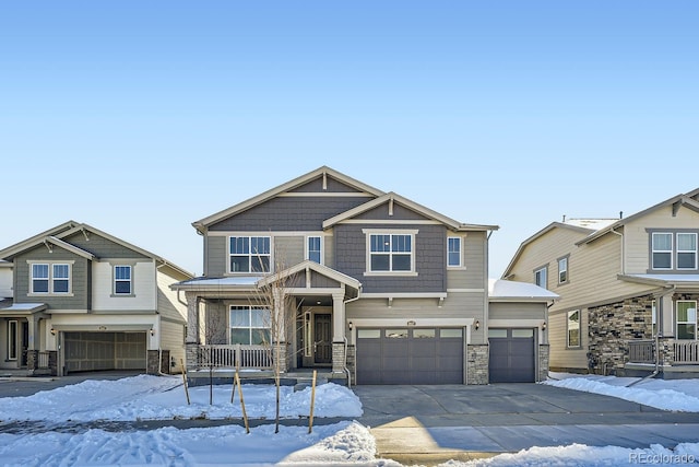 craftsman inspired home with a garage