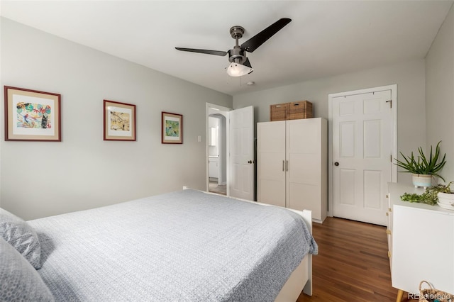 1800 Grove St, Denver, CO 80204 - bedroom with dark wood-style flooring and ceiling fan